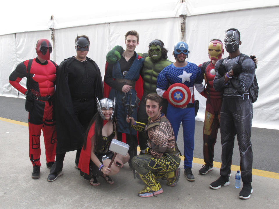 People dressed as comic book characters at Comic Con Africa, a three-day comic book and pop culture convention in South Africa, on Saturday, Sept. 15, 2018. Wonder Woman and other superheroes were in abundance, but also some African characters seemingly sparked by the success of Marvel's "Black Panther" film. (AP Photo/Christopher Torchia)