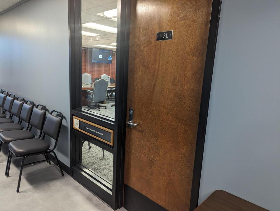 The door closes to the Oklahoma State Board of Education room where Summer Boismier’s teacher license revocation hearing was being held Wednesday, June 21, 2023. Spokespeople for the Oklahoma State Department of Education said the Board adopted certain state court rules for the administrative hearing that disallowed cameras from being used inside the room by members of the press.
