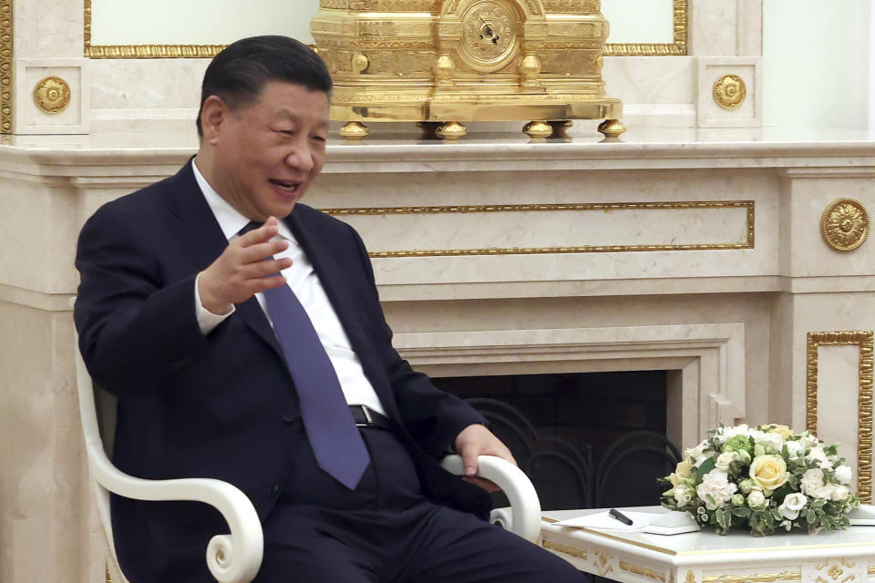 Chinese President Xi Jinping gestures while speaking to Russian President Vladimir Putin during their meeting at the Kremlin in Moscow, Russia, Monday, March 20, 2023. (Sergei Karpukhin, Sputnik, Kremlin Pool Photo via AP)