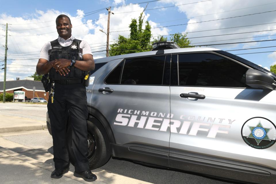 Sergeant Eard Trimmingham poses for a portrait outside the Richmond County Sheriff's Office on Thursday, May 2, 2024.