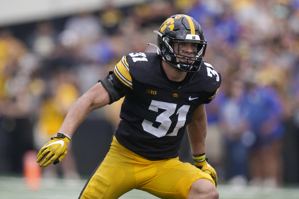 FILE - Iowa linebacker Jack Campbell (31) looks to make a tackle during the second half of an NCAA college football game against South Dakota State, Saturday, Sept. 3, 2022, in Iowa City, Iowa. Kansas State quarterback Adrian Martinez and Iowa linebacker Jack Campbell were among 15 players named finalists Wednesday, Oct. 26, 2022, for the William V. Campbell Trophy, given to college football's top scholar-athlete. (AP Photo/Charlie Neibergall, File)