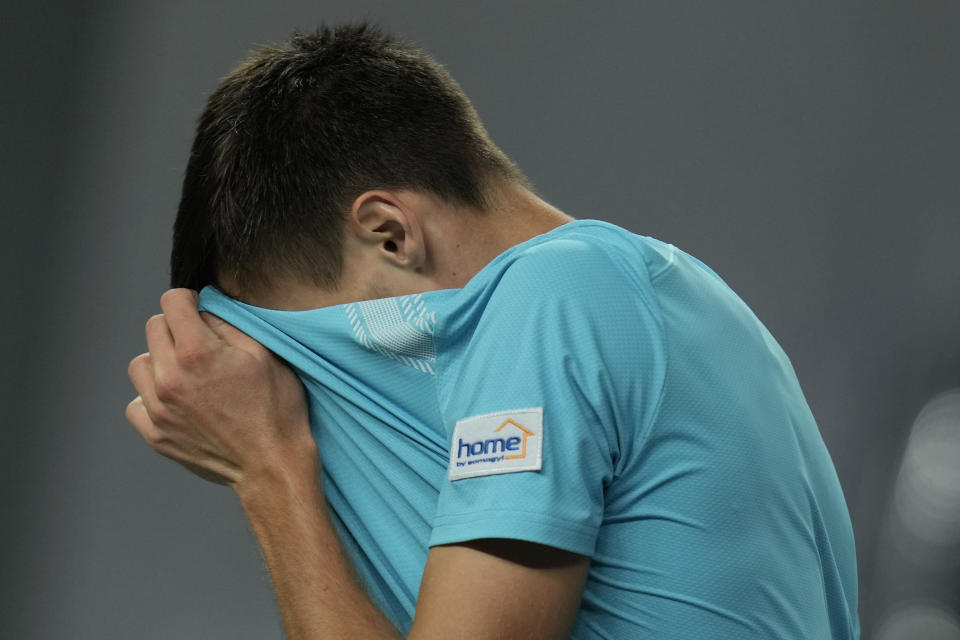 Fabian Marozsan of Hungary reacts during the men's singles quarterfinal match against Hubert Hurkacz of Poland in the Shanghai Masters tennis tournament at Qizhong Forest Sports City Tennis Center in Shanghai, China, Thursday, Oct. 12, 2023. (AP Photo/Andy Wong)