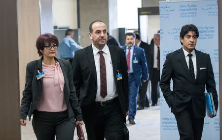 Syria's opposition delegation leader Nasr al-Hariri (C) arrives for a meeting of Intra-Syria peace talks with UN Special Envoy for Syria Staffan de Mistura at Palais des Nations in Geneva, Switzerland, March 25, 2017. REUTERS/Xu Jinquan/Pool