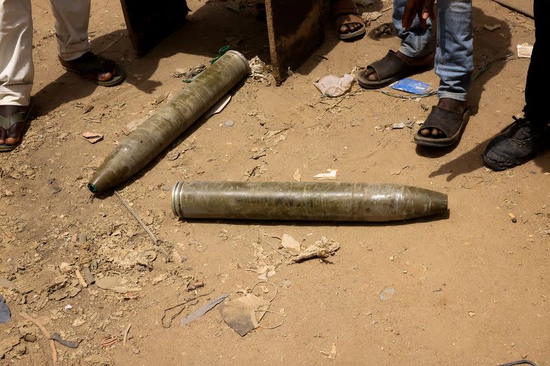 FILE PHOTO: Shells are seen on the ground at the central market in Khartoum North