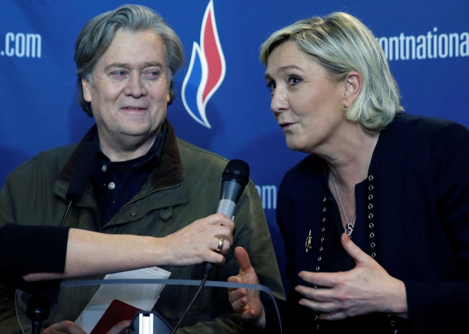 Steve Bannon with French politician Marine Le Pen at France's National Front conference in Lille, France. (Photo: Reuters/Pascal Rossignol)