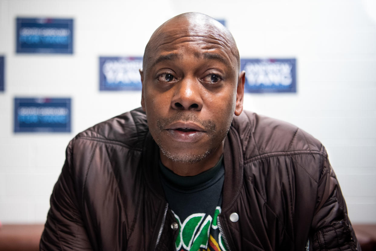 CHARLESTON, SC - JANUARY 30: Comedian Dave Chappelle talks with the media while campaigning for Democratic presidential candidate Andrew Yang on January 30, 2020 in North Charleston, South Carolina. The comedian has endorsed the candidate and performs the second of two South Carolina campaign benefit shows Thursday evening in Charleston.  (Photo by Sean Rayford/Getty Images)