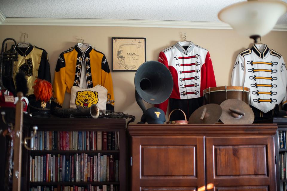 Here are some of the uniforms 67-year-old Thomas McLeish of Newark, a band director in various Ohio schools for many years, collected over his career.