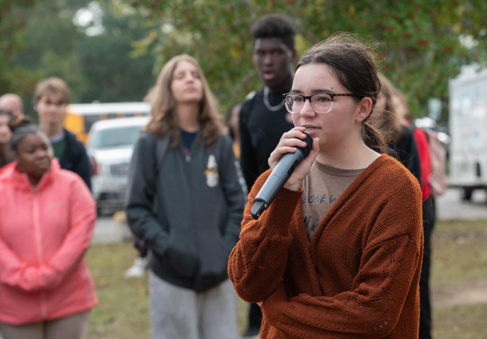 Senior Sophia Odum speaks during a memorial ceremony for Haleigh Collier at Pace High School on Thursday, Nov. 16, 2023. Collier, a 17-year-old Junior, passed away during a tragic ATV accident on Sunday, Nov. 5, 2023.