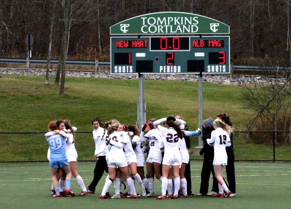 Albertus Magnus celebrates its win moments after the final whistle. It defeated defending state champion New Hartford, 3-1, on Sunday, Nov. 13, 2022.