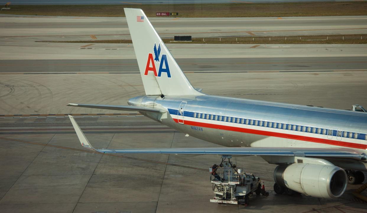 Miami, USA - February 20, 2011: American Airlines aircrafts in the airline hub terminal at Miami International Airport an the gate. AA have an important hub at Miami Airport were it connects to several domestic and international destinations.