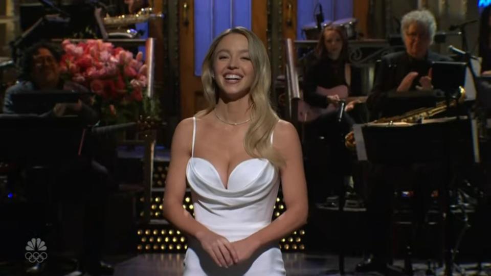 In Sweeney’s opening monologue, the “White Lotus” alum revealed that her “Anyone But You” co-star Glen Powell was in the audience and denied the rumors that the pair were secretly dating. NBC / SNL