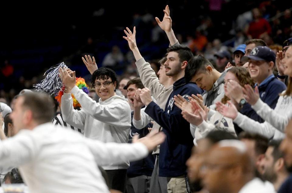 Penn State men’s basketball fans cheer during the game against Illinois on Tuesday, Feb. 14, 2023.