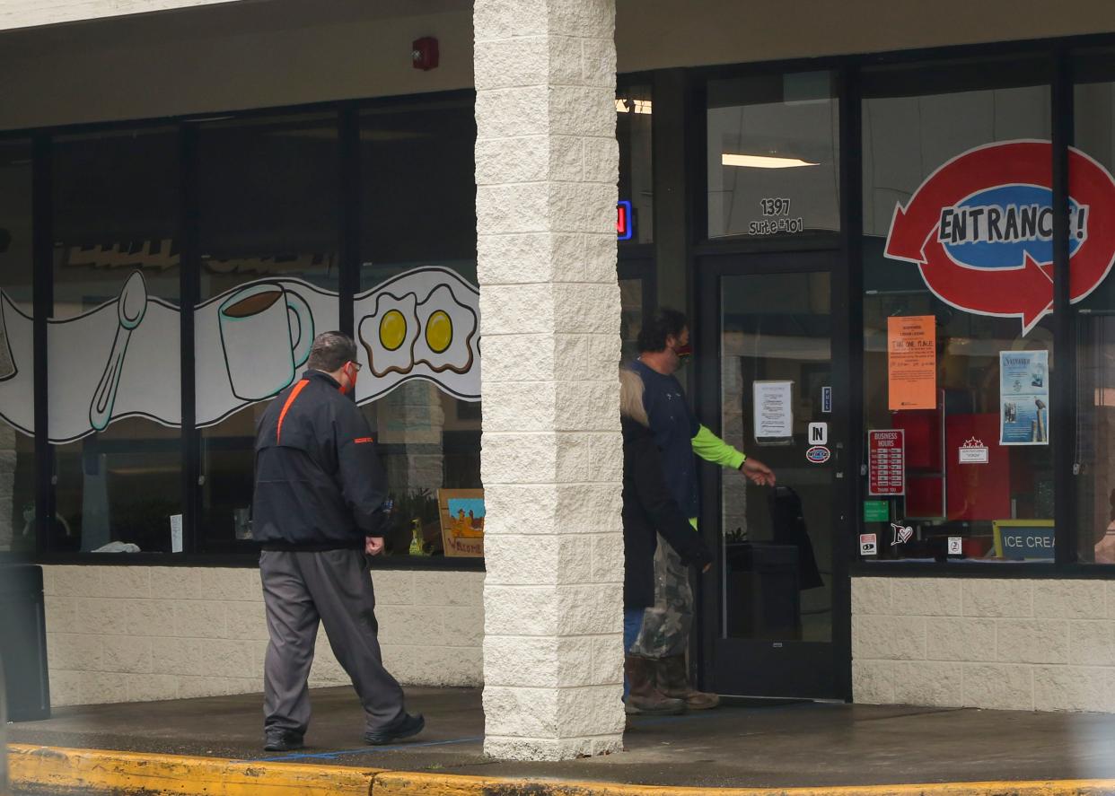 FILE — Customers continued to dine indoors at That One Place, a restaurant in Port Orchard that has continued to allow indoor dining despite an order of restraint and fines being placed on the business for defying Governor Inslee's COVID-19 guidelines.