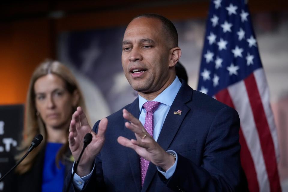 House Minority Leader Hakeem Jeffries, D-N.Y., joined by fellow Democrats, speaks with reporters about the political brinksmanship over the debt ceiling negotiations, at the Capitol in Washington, Thursday, May 25, 2023. Democrats have balked at Republican efforts to tighten work requirements for social safety net programs. (AP Photo/J. Scott Applewhite) ORG XMIT: DCSA120