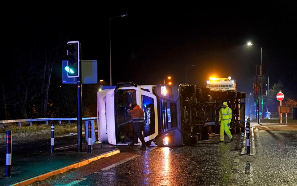 A lorry blown over in high winds blocks the A179 near Hartlepool, County Durham - Owen Humphreys 