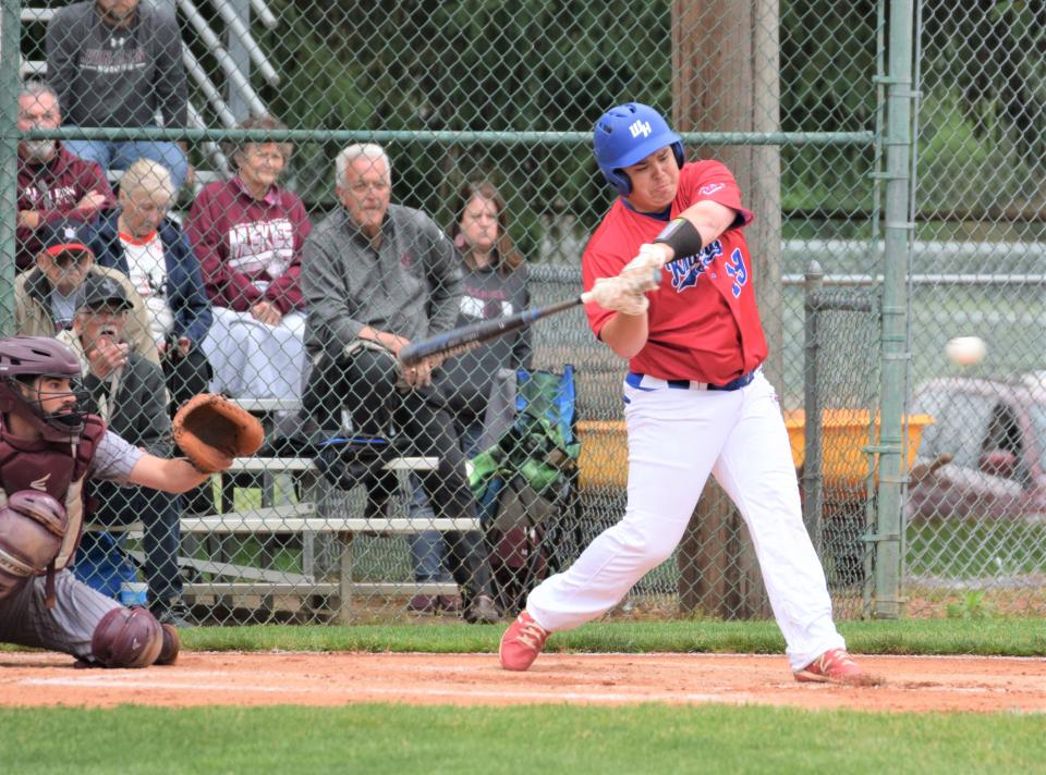 West Holmes clean-up hitter Micah Martin drives a single to center in the first inning to load the bases, leading to the first run for the Kinghts.