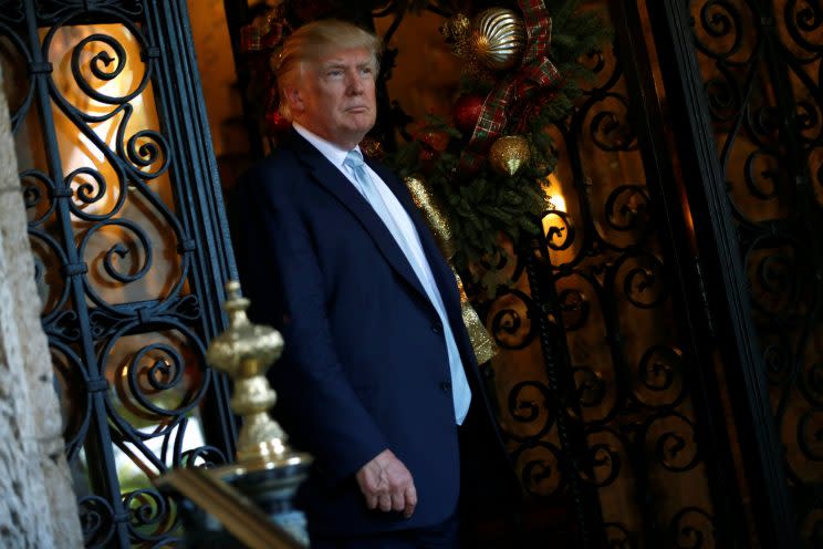 Donald Trump speaks briefly to reporters between meetings at the Mar-a-lago Club in Palm Beach, Fla. (Photo: Reuters/Jonathan Ernst)