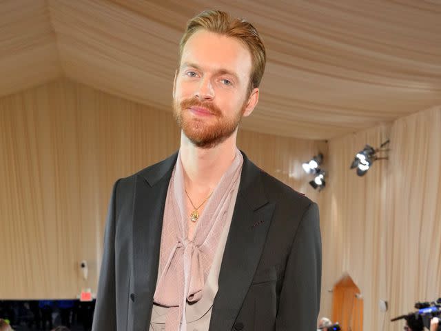<p>Kevin Mazur/MG22/Getty</p> Finneas O'Connell arrives at The 2022 Met Gala Celebrating "In America: An Anthology of Fashion" on May 02, 2022.