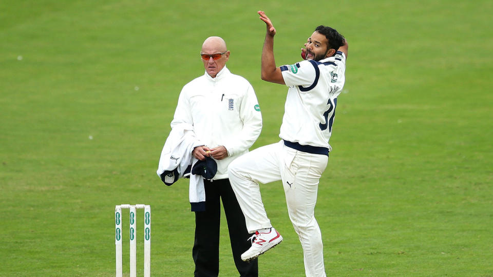 Azeem Rafiq can be seen bowling for Yorkshire during his stint with the English county.