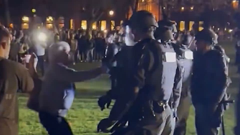 Annelise Orleck is seen confronting police during a protest at Dartmouth College in New Hampshire on May 1, 2024. - WMUR