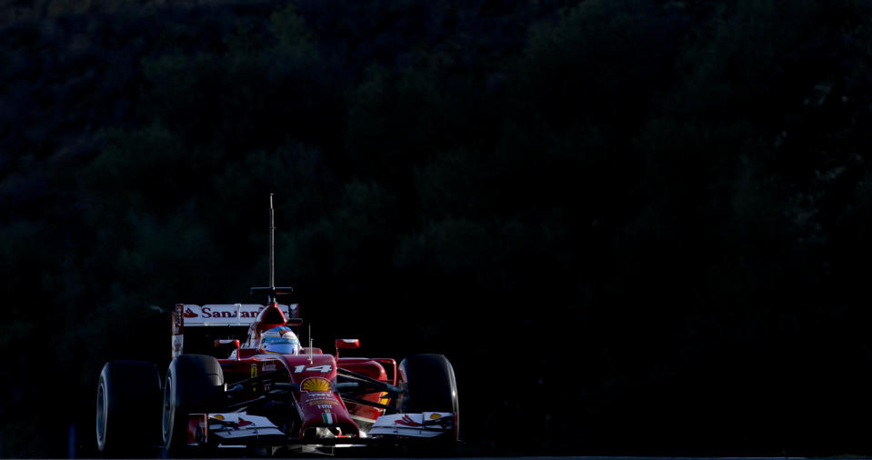 Fernando Alonso of Spain and Ferrari drives the new F14T car during the 2014 Formula One Testing at the Circuito de Jerez on Thursday, Jan. 30, 2014, in Jerez de la Frontera, Spain. (AP Photo/Miguel Angel Morenatti)