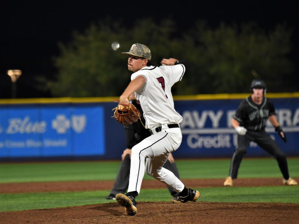 Tate senior pitcher Rilee Lowery fires a pitch to home plate during the team's 8-3 victory against South Walton on Thursday, March 23, 2023 from Blue Wahoo Stadium.