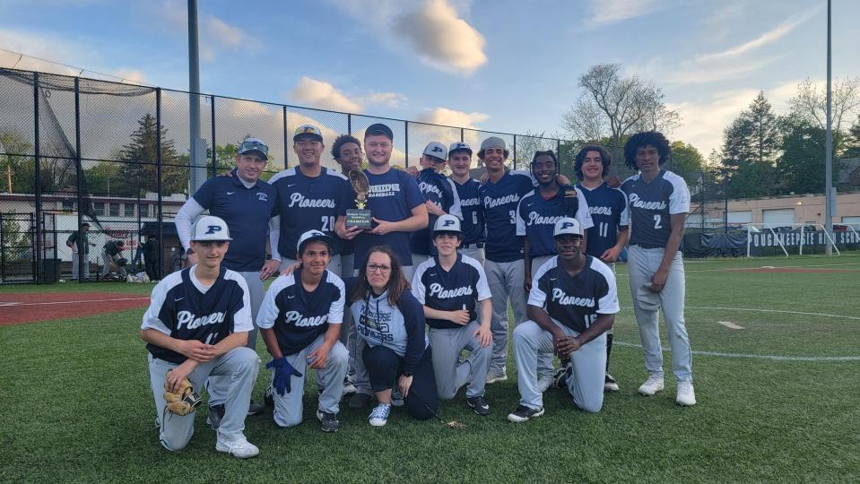 The Poughkeepsie baseball team poses after defeating East Ramapo to win the Section 1 independent league title in May 2022.