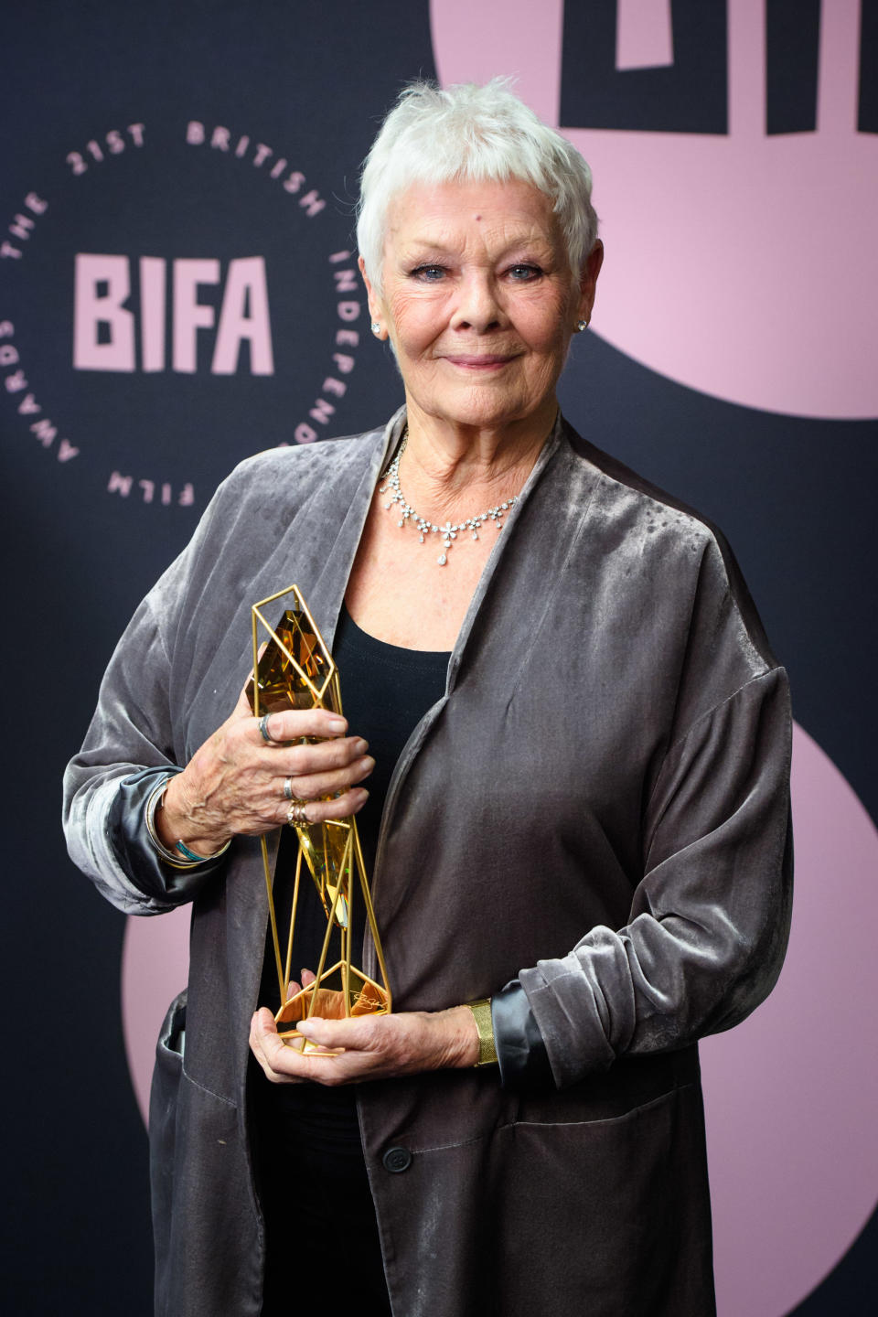 Dame Judi Dench with the Richard Harris Award for Outstanding Contribution by an actor to British Film, during the twenty-first British Independent Film Awards, held at Old Billingsgate, London.