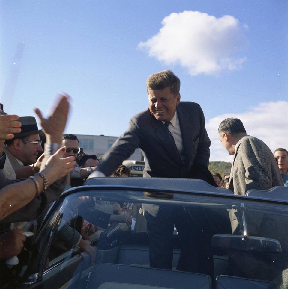 JFK shaking hands with crowd