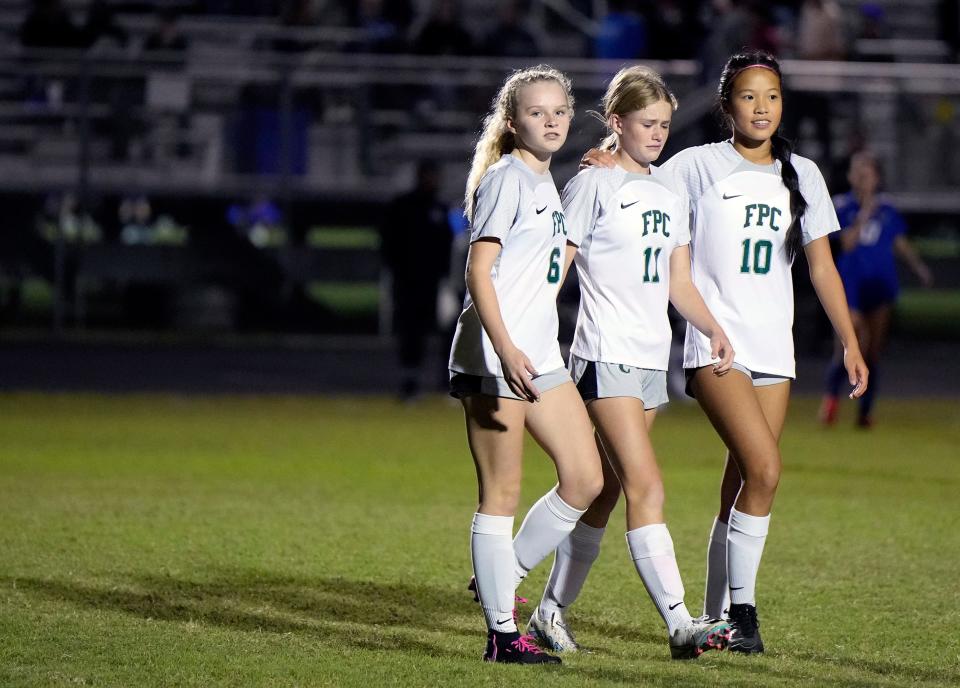 Flagler Palm Coast freshmen Katherine Ouellette (6) Lauralee Macleod (11) and Ivy Chen (10) during a match with Matanzas at Matanzas High School in Palm Coast, Tuesday, Dec.5, 2023.