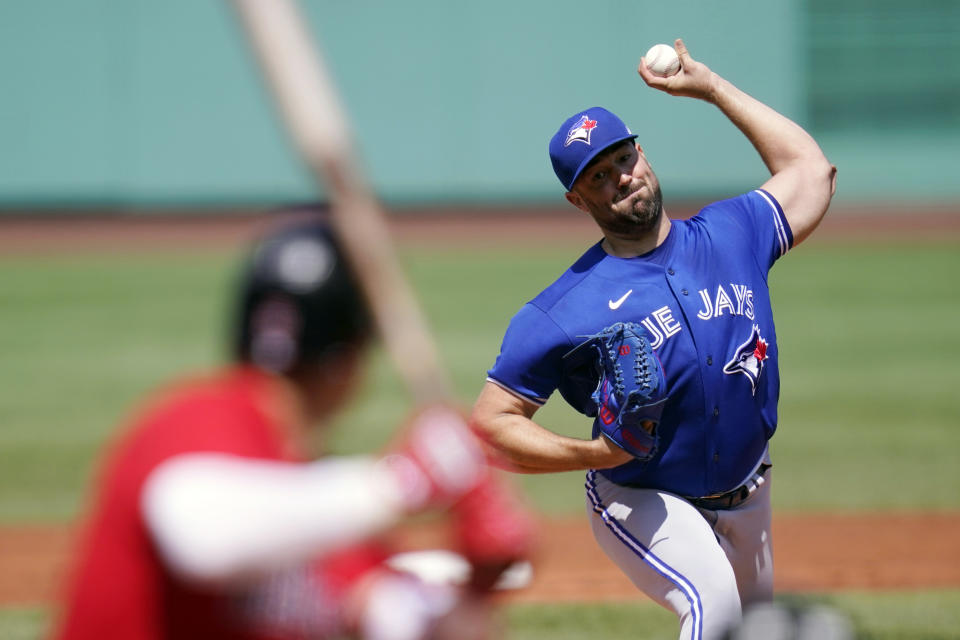 Toronto Blue Jays starting pitcher Robbie Ray delivers during the first inning of a baseball game against the Boston Red Sox at Fenway Park, Wednesday, July 28, 2021, in Boston. (AP Photo/Charles Krupa)