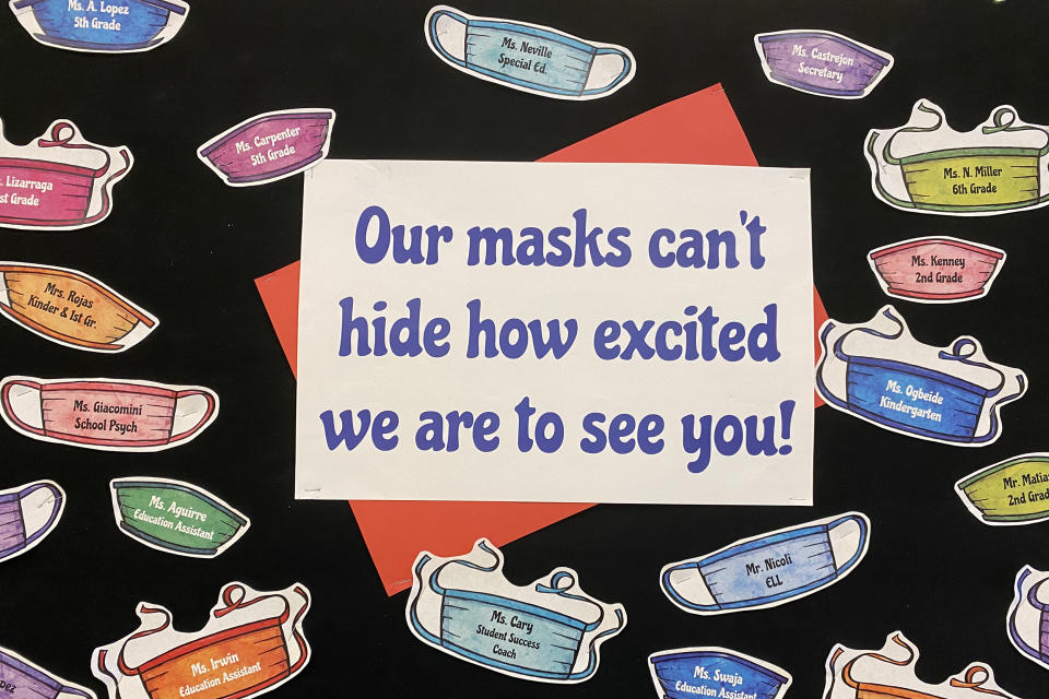 Image: A sign proclaiming their excitement to see students, despite masks, spoke for the staff of Witch Hazel Elementary in Hillsboro, Oregon. Staff members were proud of how they'd worked together to get through the many challenges of the 2020-21 school (Lillian Mongeau / The Hechinger Report)