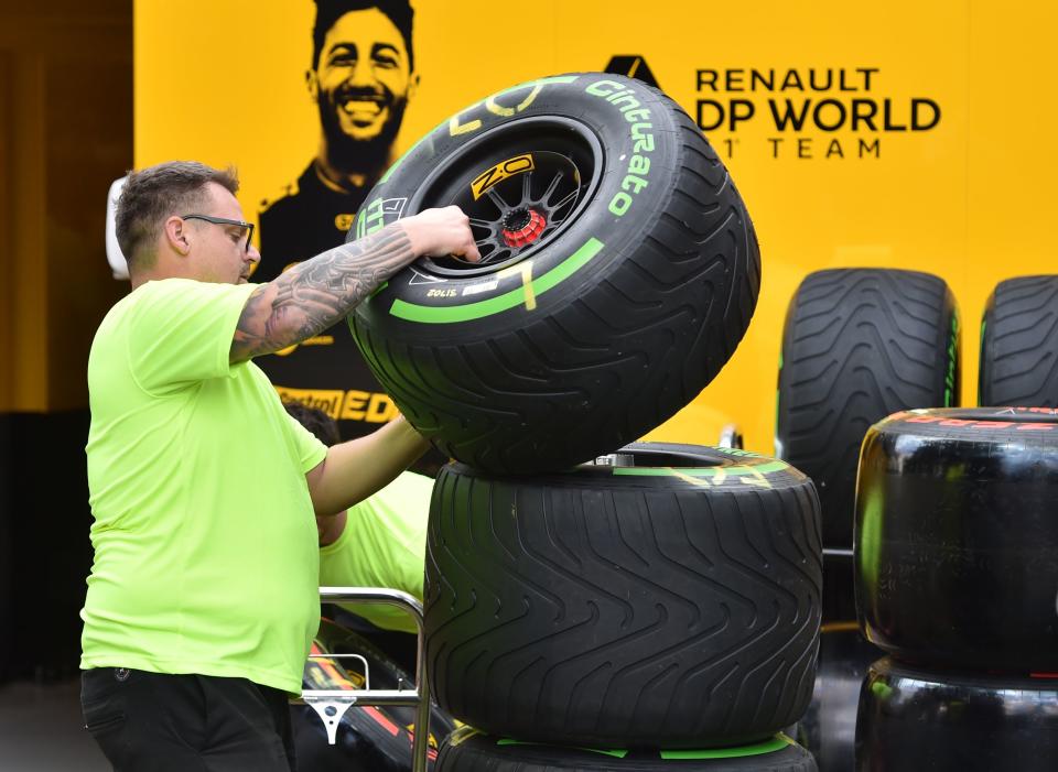 Tyres are loaded up outside the Renault garage as the Formula One Australian Grand Prix is cancelled in Melbourne on March 13, 2020. - The season-opening Australian Grand Prix was cancelled on March 13 just hours before the action was due to start over fears about the spread of coronavirus after a McLaren team member tested positive. (Photo by Peter PARKS / AFP) / -- IMAGE RESTRICTED TO EDITORIAL USE - STRICTLY NO COMMERCIAL USE -- (Photo by PETER PARKS/AFP via Getty Images)