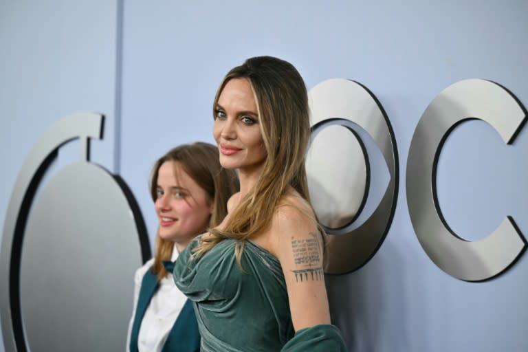 US actress Angelina Jolie (R), seen with daughter Shiloh, is one of the producers of 'The Outsiders,' which won the Tony Award for best musical (ANGELA WEISS)