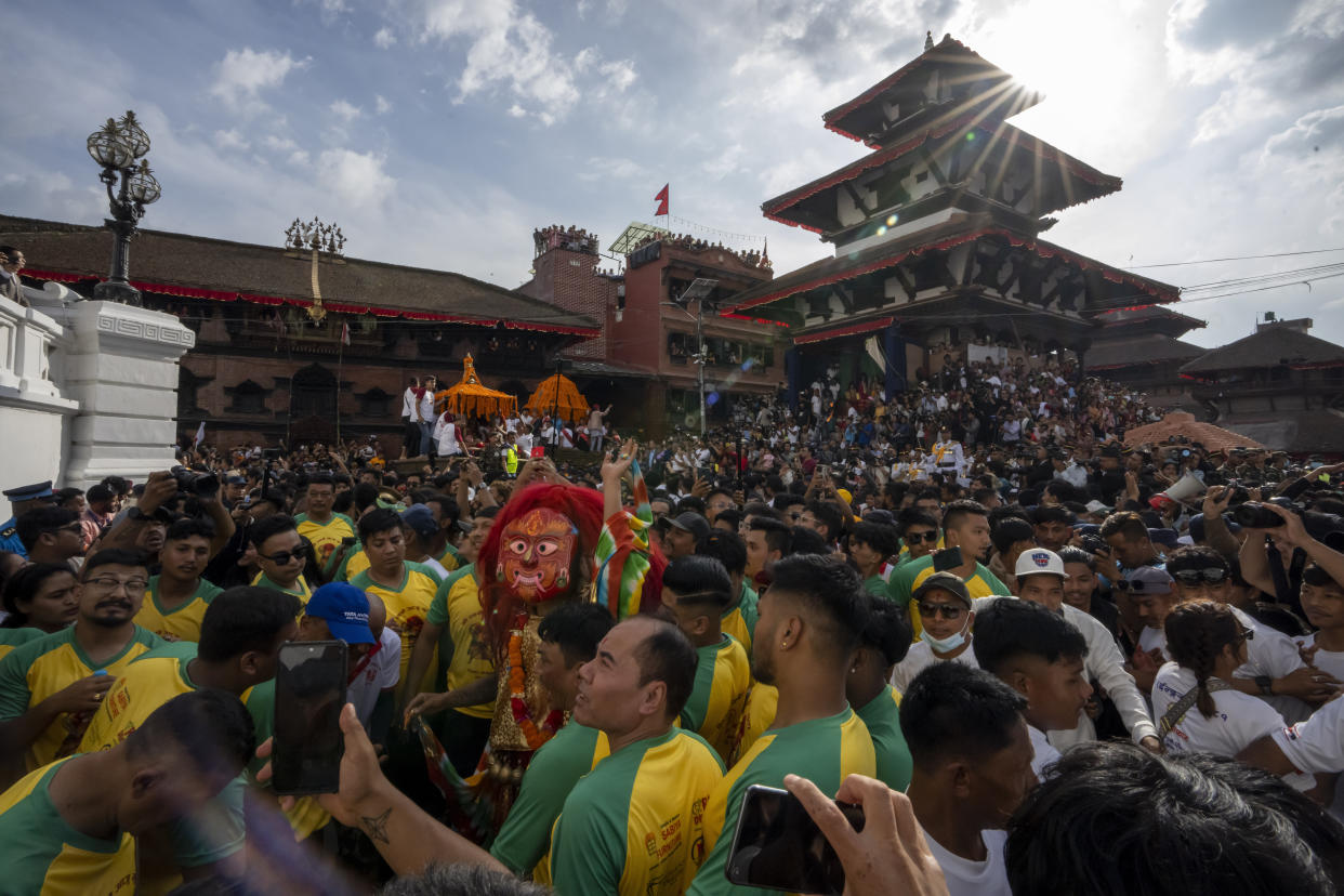 The Lakhe, a demon adored for divine might, performs during Indra Jatra, a festival that marks the end of the rainy season in Kathmandu, Nepal, Tuesday, Sept. 17, 2024. (AP Photo/Niranjan Shrestha)