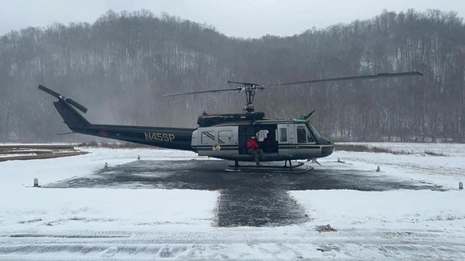 Powell County Search & Rescue teams, with Kentucky State Police, rescue four college students stranded in snowy, cold conditions from Courthouse Rock in Red River Gorge