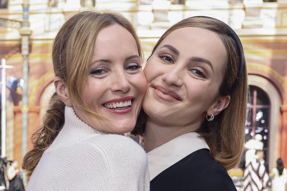 Leslie Mann, left, and Maude Apatow attend the Valentino Spring/Summer 2024 womenswear fashion collection presented Sunday, Oct. 1, 2023 in Paris. (AP Photo/Vianney Le Caer)