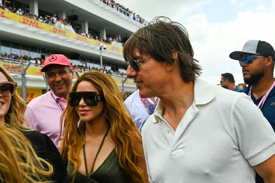 US actor Tom Cruise (R) and Colombian singer Shakira (L) attend the 2023 Miami Formula One Grand Prix at the Miami International Autodrome in Miami Gardens, Florida, on May 7, 2023