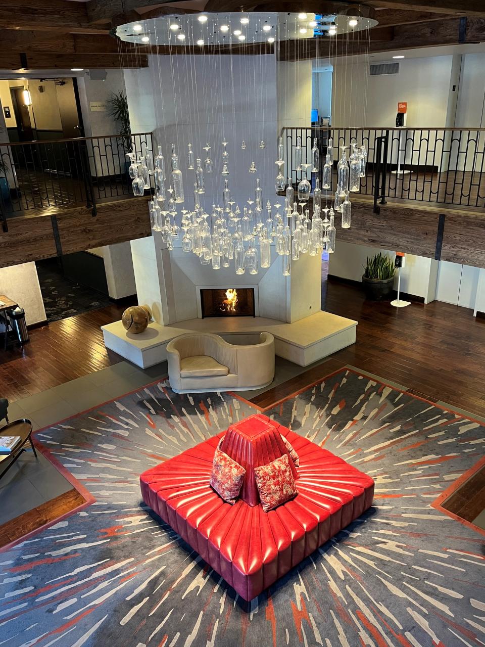 The lobby of Hotel Corque offers roaring fire, love-seats and wine tasting.