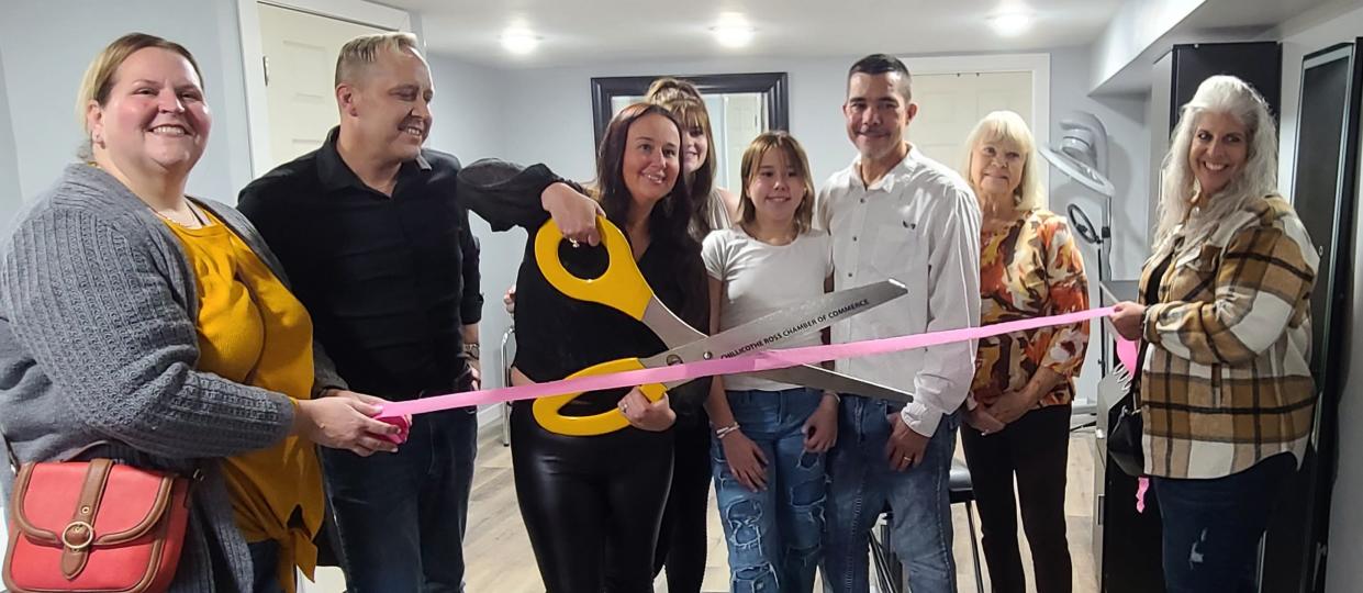 Brooke Cheatham-McAbee cuts the ribbon on her new salon ad day spa. She hopes customers will feel relaxed i the country and leave feeling beautiful inside and out.