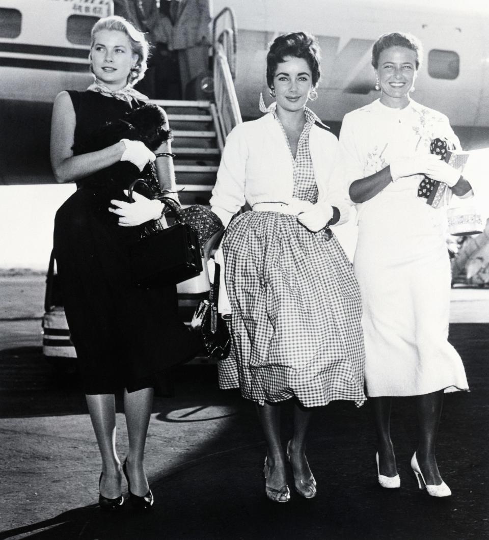 Arriving at New York's International Airport, 9/1/1954: Grace Kelly, who is starting a vacation; Liz Taylor, en route to England to join husband Michael Wilding; and Larraine Day, here to root for her husband's Giants.