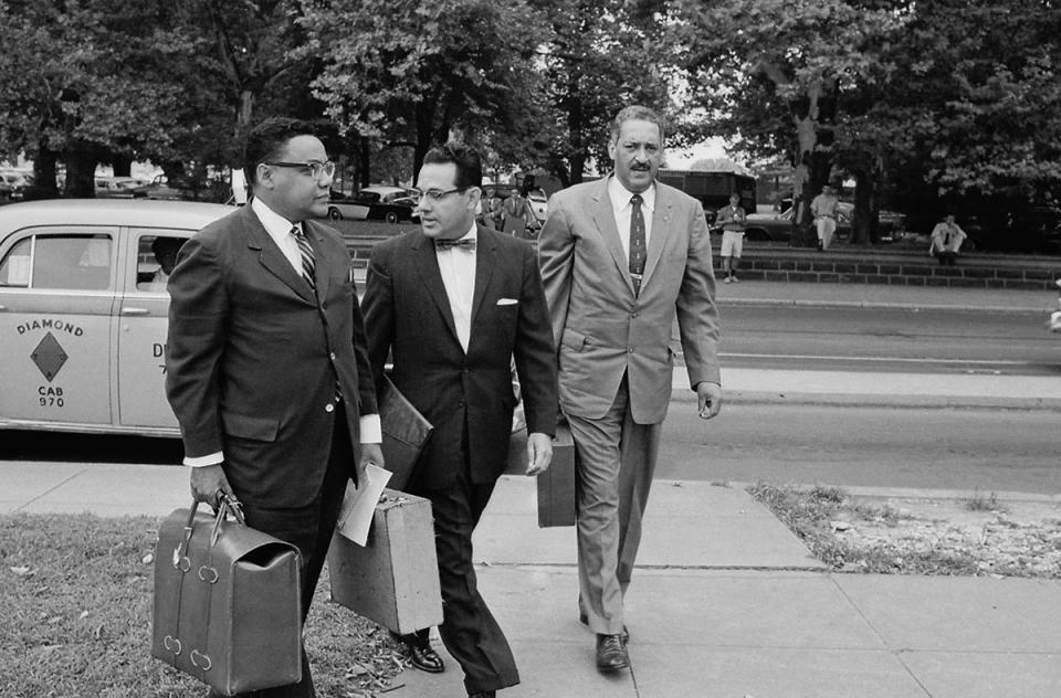 Wiley Branton, flanked by William Coleman and Thurgood Marshall, arrives at the U.S. Supreme Court to present arguments in the Little Rock Nine school integration case. (Getty Images)