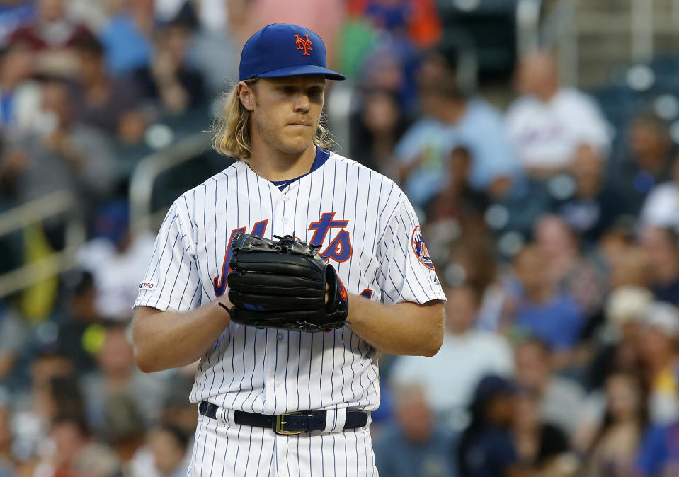 NEW YORK, NEW YORK - JULY 24:   Noah Syndergaard #34 of the New York Mets in action against the San Diego Padres at Citi Field on July 24, 2019 in New York City.  The Padres defeated the Mets 7-2. (Photo by Jim McIsaac/Getty Images)
