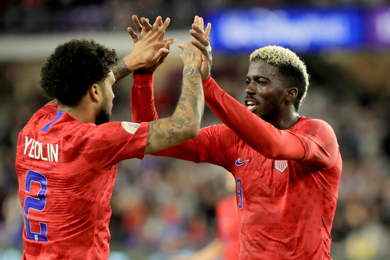 U.S. forward Gyasi Zardes (right) is congratulated by DeAndre Yedlin after scoring his second goal Friday night against Canada (Sam Greenwood/Getty)