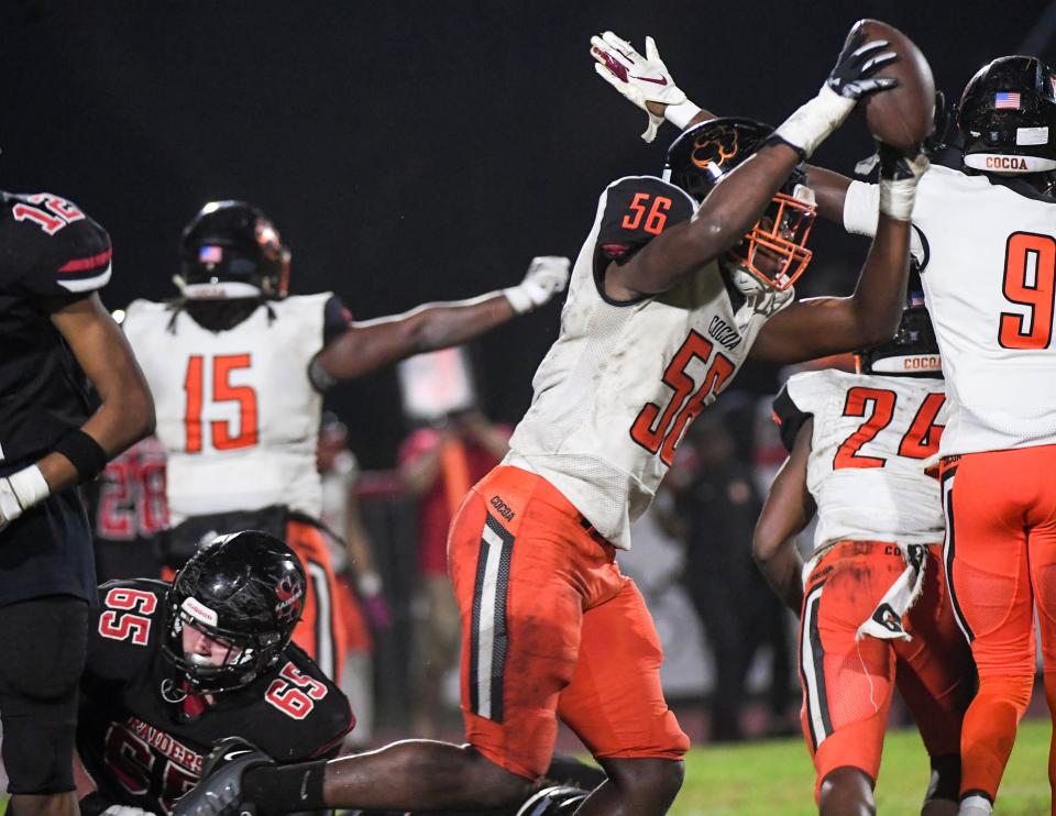 Javion Hilson of Cocoa Tigers celebrates recovering a South Sumter fumble during the FHSAA football Class 2S final four. Craig Bailey/FLORIDA TODAY via USA TODAY NETWORK