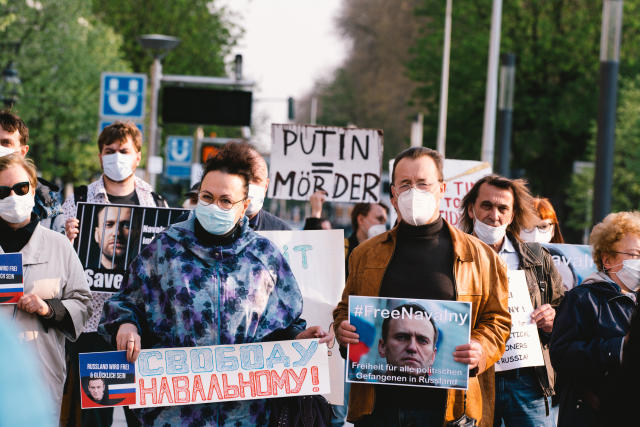 Protesters in D&#xfc;sseldorf, Germany, rally to support Russian opposition politician Alexei Navalny, April 21, 2021