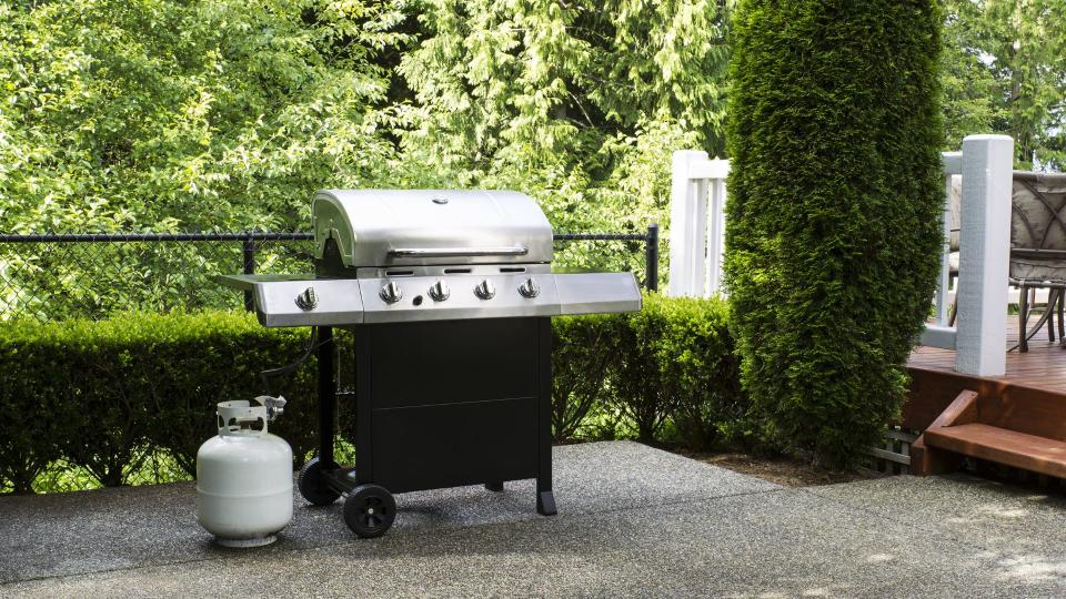 Gas grill in a yard