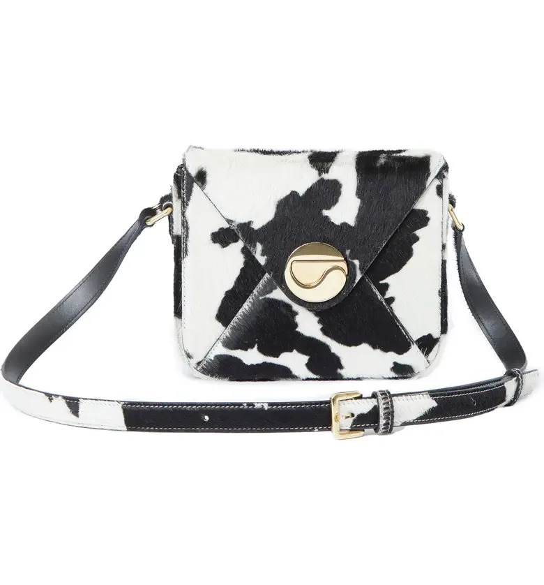 Coperni Mailbox Cow Print Genuine Calf Hair Crossbody Bag. Image via Nordstrom.