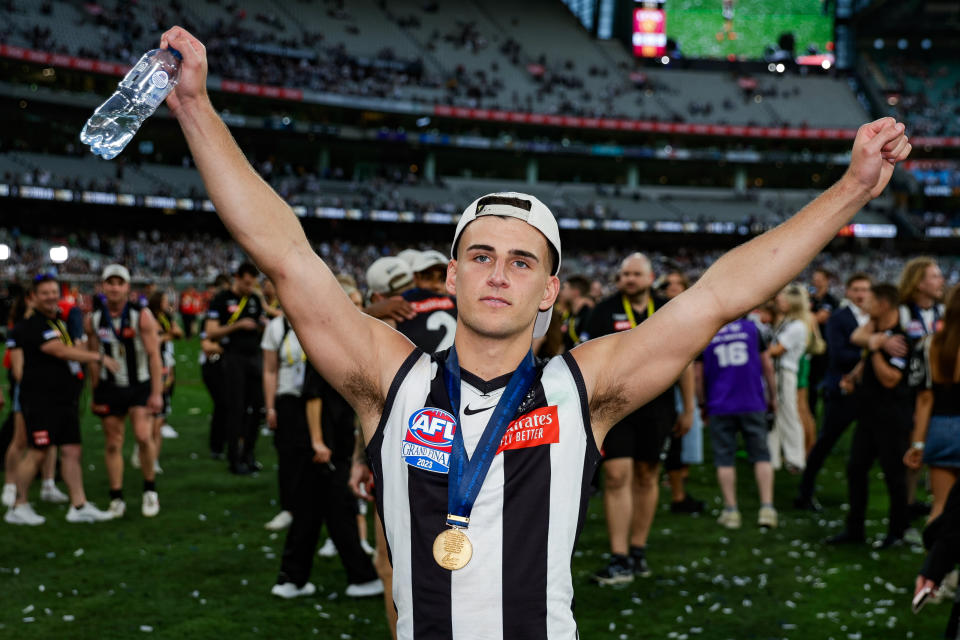 Nick Daicos celebrates the AFL grand final win.