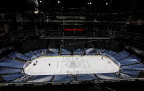 Players prepare for a skate at the NHL hockey playoffs venue in Edmonton, Alberta, Friday, Aug. 28, 2020. Boston Bruins captain Zdeno Chara hopes players and fans take a step back to pause and reflect on racial justice issues as the NHL takes a second day off from second-round series action on Friday, before games resume on Saturday. (Jason Franson/The Canadian Press via AP)